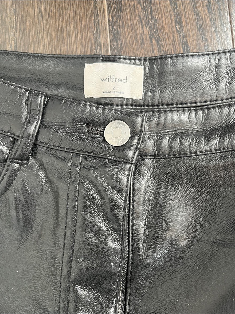 Aritzia Wilfred Black Faux Leather Mini Skirt with Branded Button
